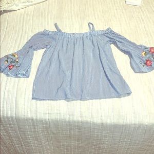 a open shoulder white and blue striped shirt